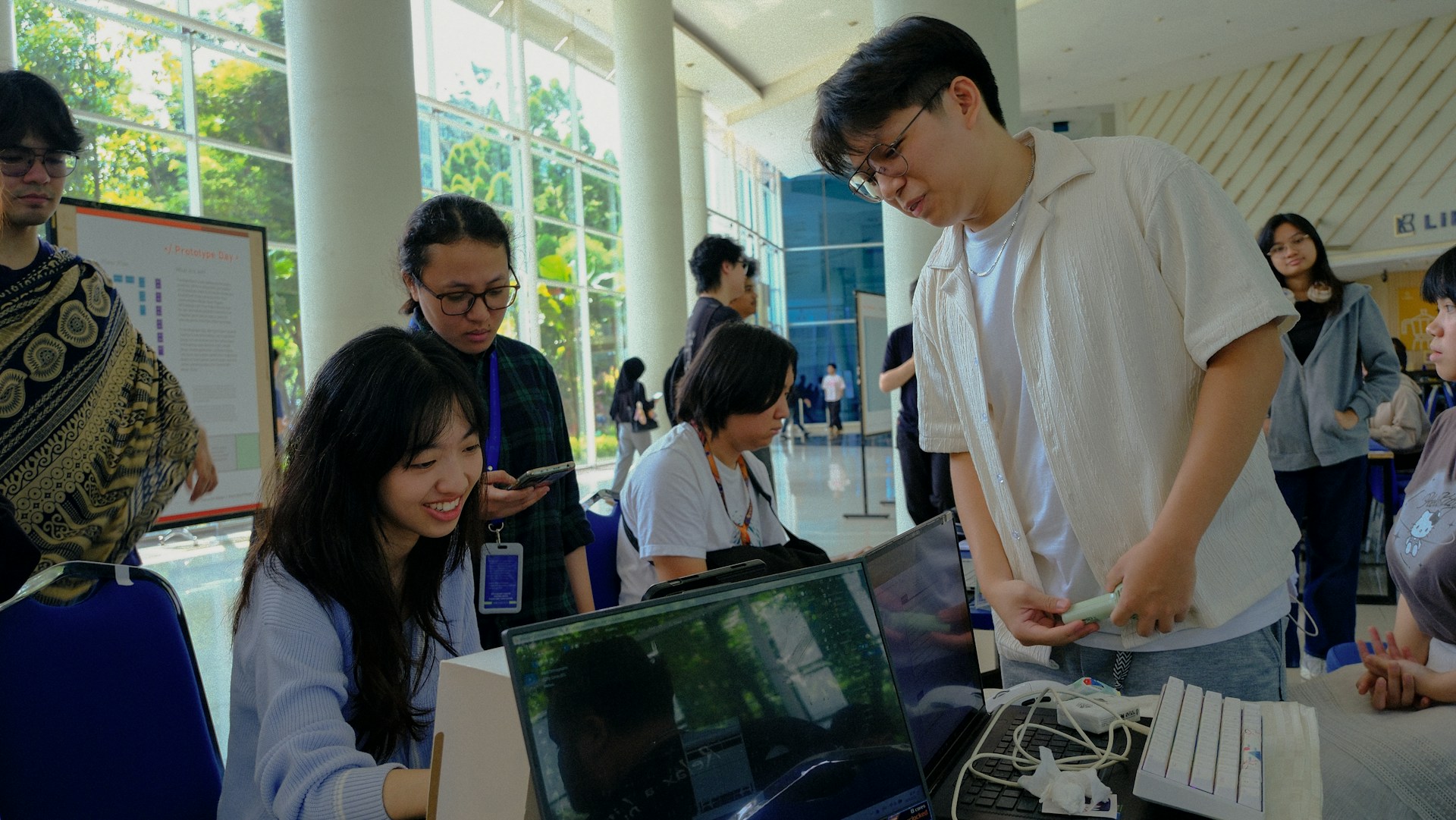 Students collaborating in modern digital center